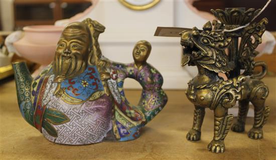 Chinese teapot and dragon candle holder